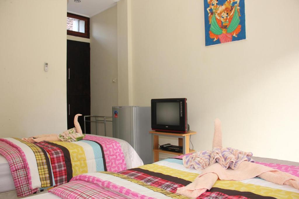 Апартаменти Warung Coco Poppies 2 Кута Номер фото